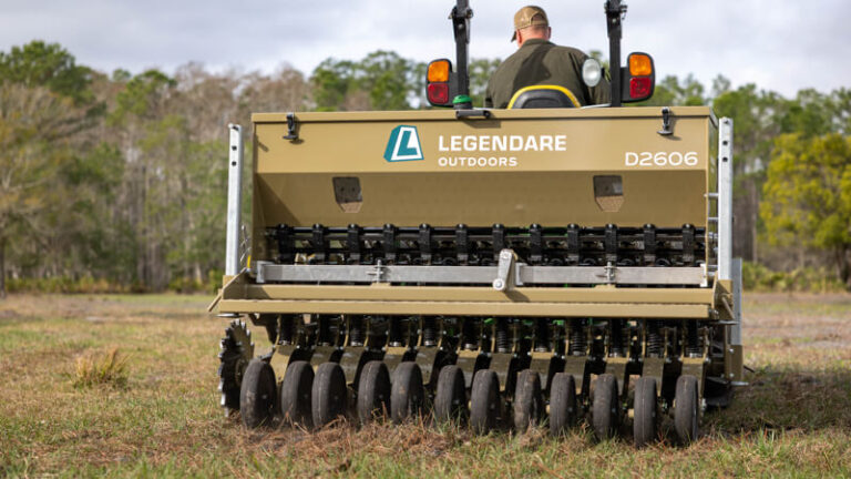 legendare seed drill at work in field