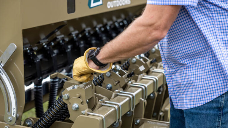 man adjusting legendare drill