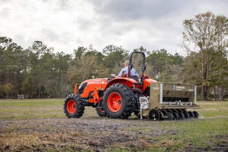 tractor pulling a legendare seed drill